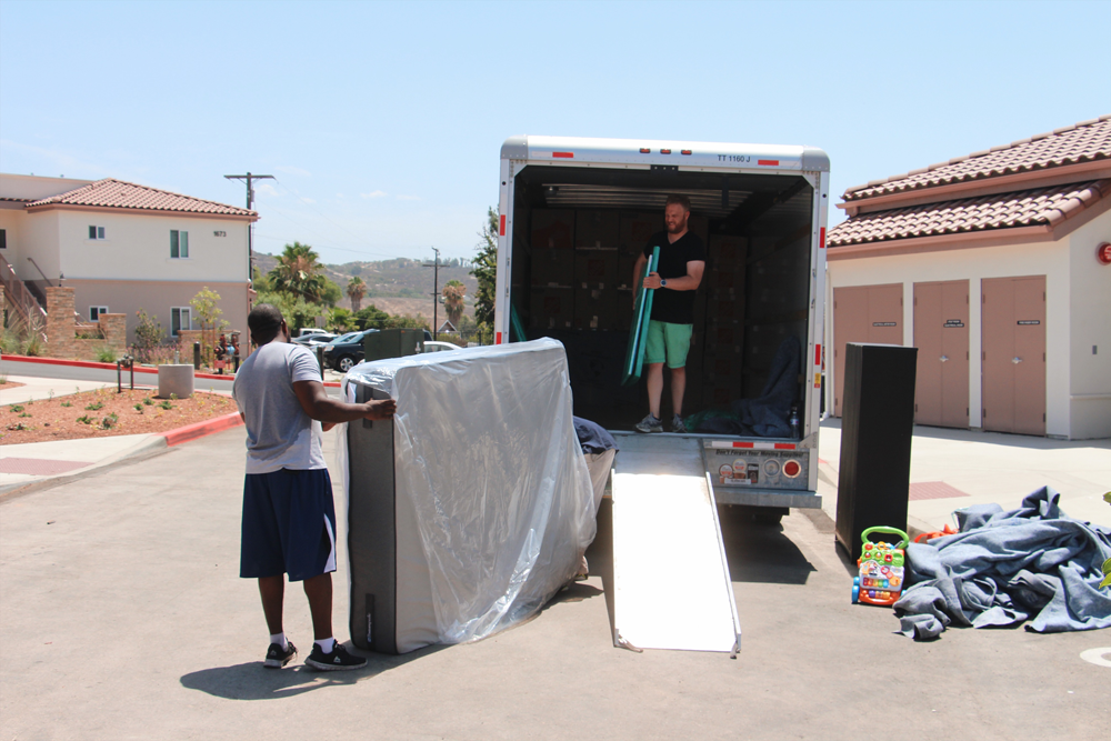 Students unloading truck